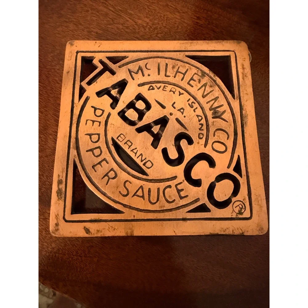 Tabasco  Cast Iron Trivet wall hanger  5.5in Copper Good Vintage  Co Kitchen